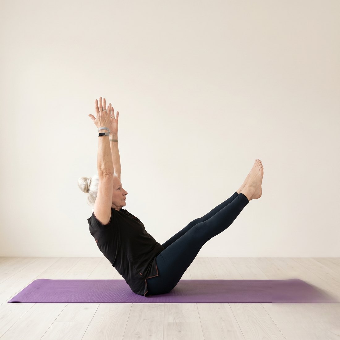 Michelle demonstrating Boat Pose (Navasana)