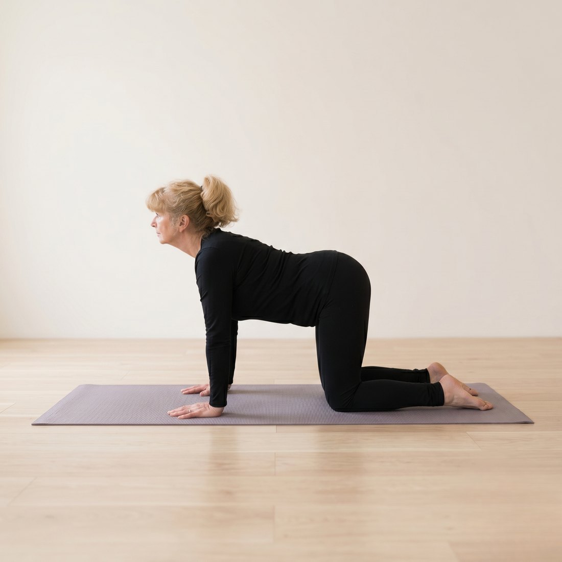 Michelle demonstrating Cat-Cow Pose