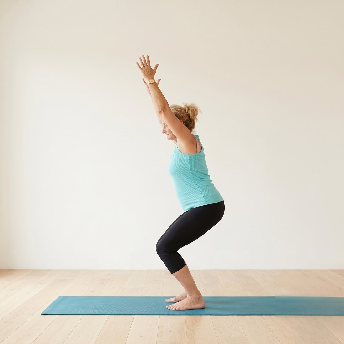 Michelle demonstrating Chair Pose (Utkatasana)