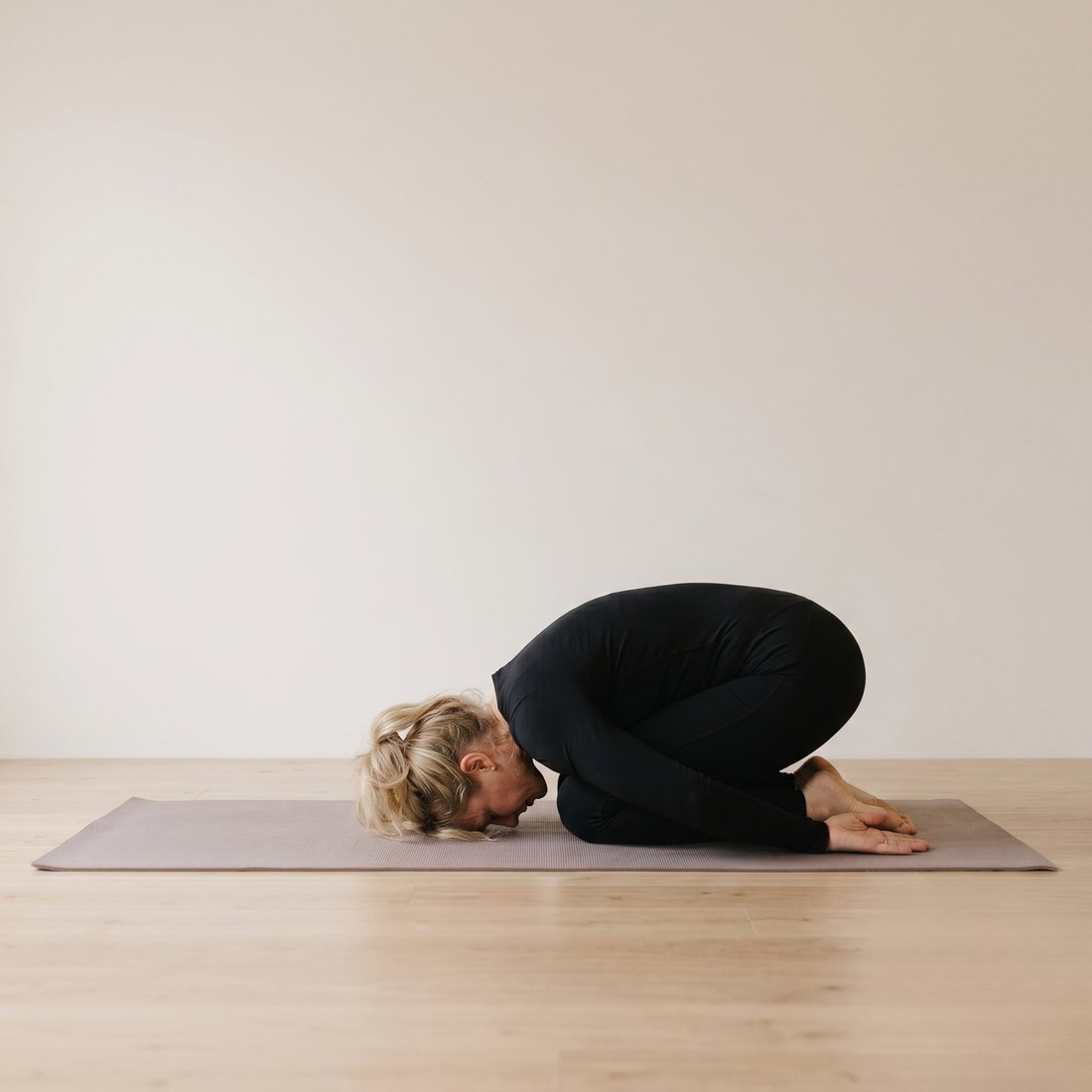 Michelle demonstrating Child's Pose