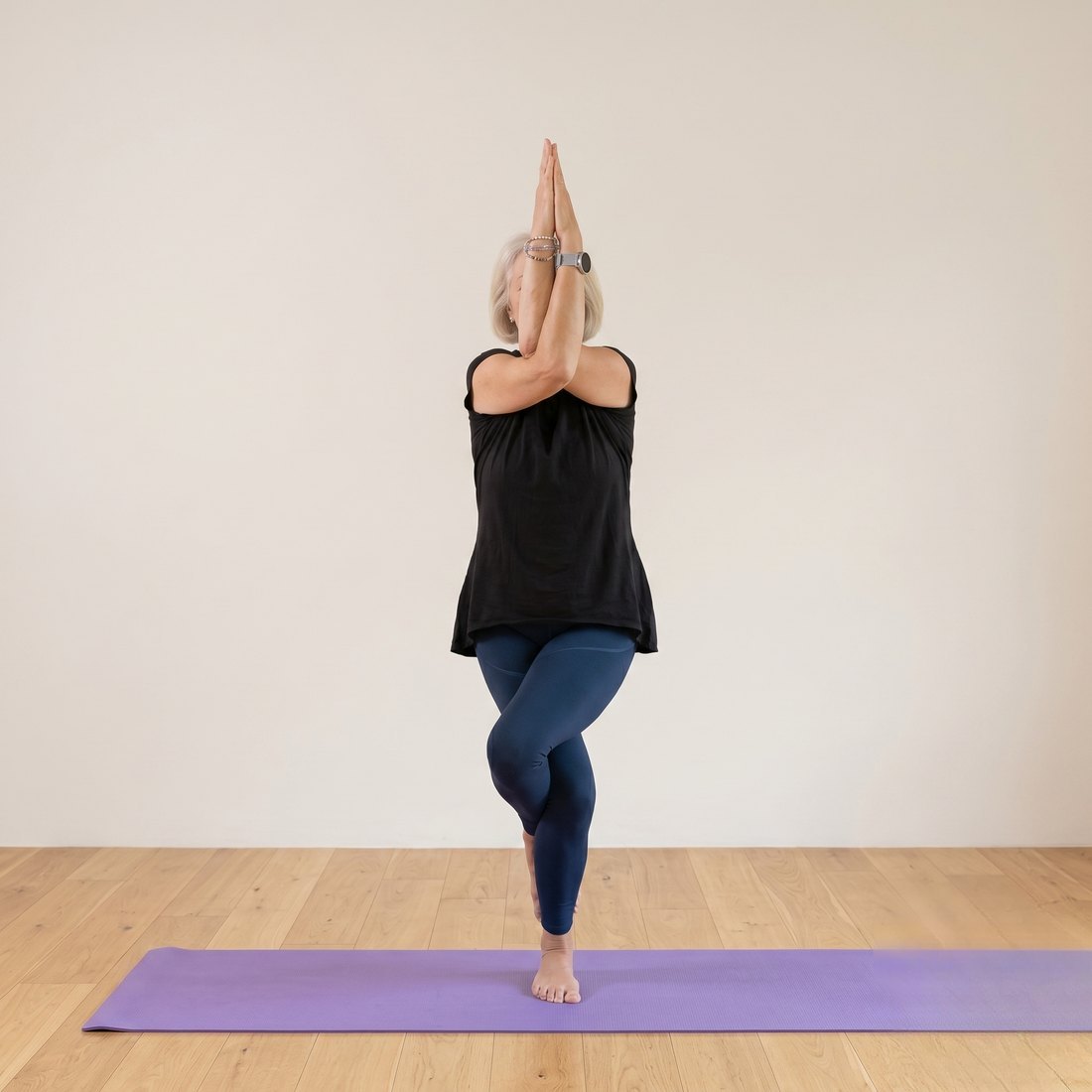 Michelle demonstrating Eagle Pose (Garudasana)